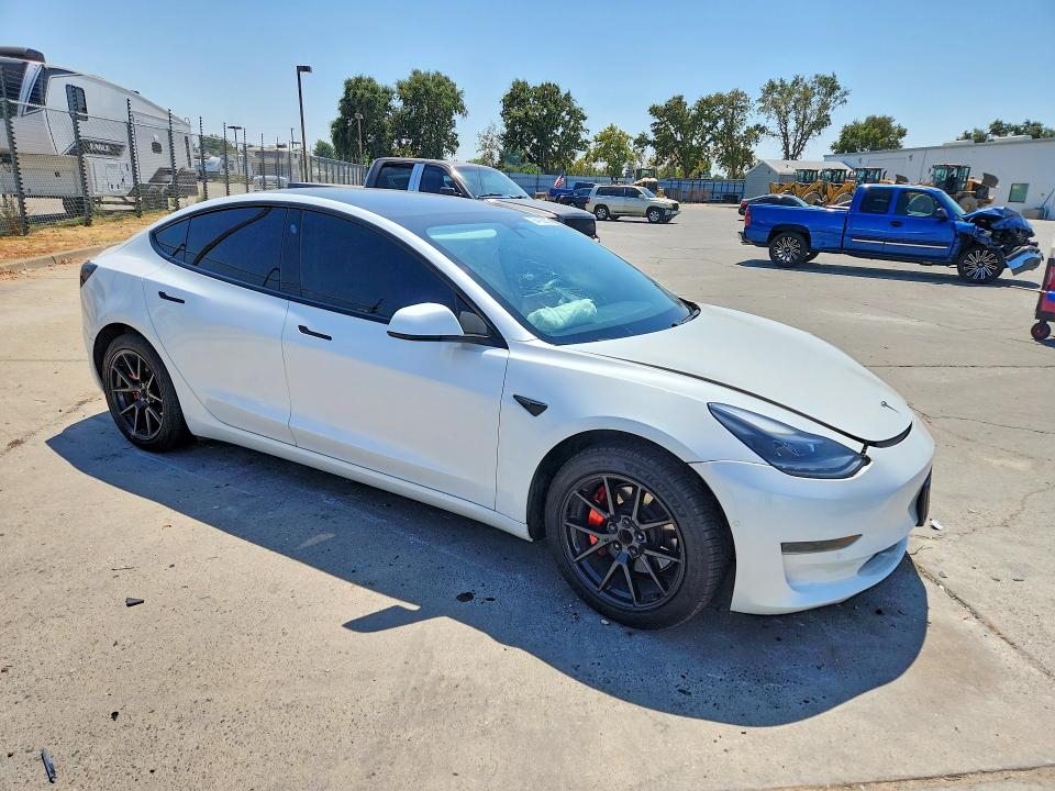 Photo 4 from auction – 2021 TESLA MODEL 3 with VIN 5YJ3E1EA0MF868142