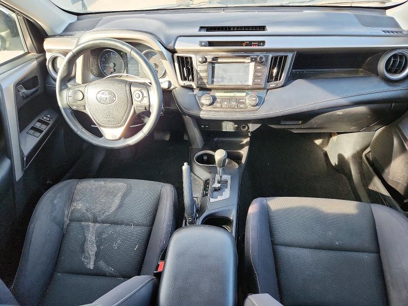Photo 8 from auction – 2018 TOYOTA RAV4 with VIN 2T3RFREV8JW792278