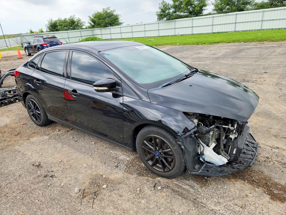 Photo 4 from auction – 2016 FORD FOCUS with VIN 1FADP3F29GL250794