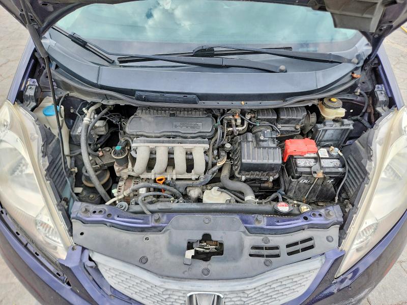Photo 11 from auction – 2009 HONDA FIT with VIN JHMGE88499S075558