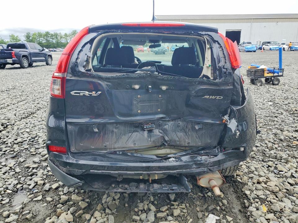 Photo 6 from auction – 2015 HONDA CR-V with VIN 5J6RM4H39FL096486
