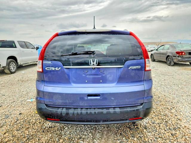 Photo 6 from auction – 2014 HONDA CR-V with VIN 5J6RM4H75EL063258