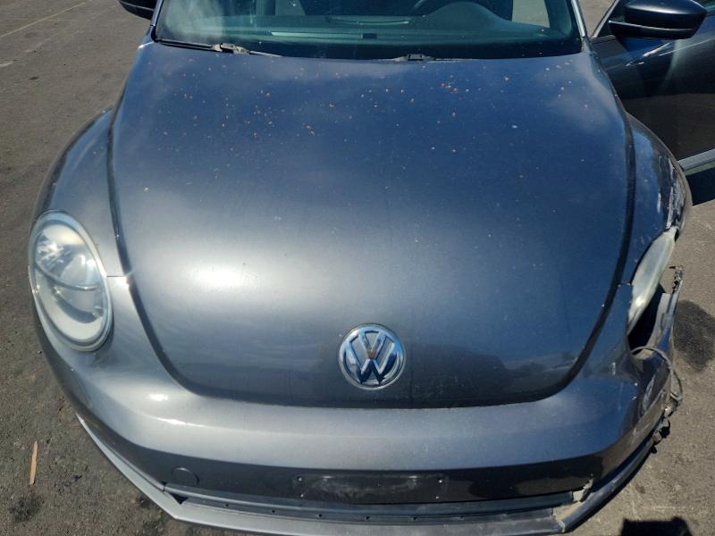 Photo 11 from auction – 2014 VOLKSWAGEN BEETLE with VIN 3VWF17AT6EM634388