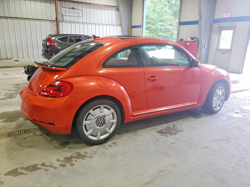 Photo 3 from auction – 2016 VOLKSWAGEN BEETLE with VIN 3VWJ17AT5GM617773