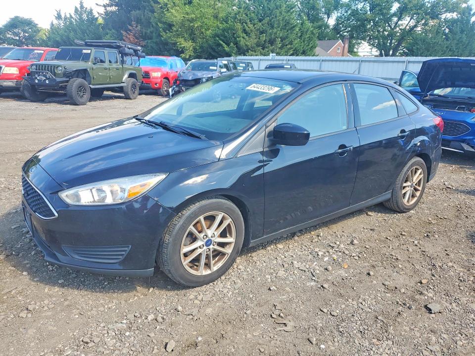 FORD FOCUS 2018 with VIN 1FADP3FE5JL209466 - Photo from auction