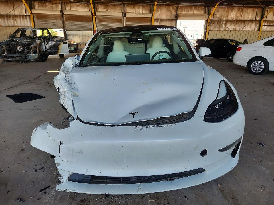 Photo 5 from auction – 2022 TESLA MODEL 3 with VIN 5YJ3E1EB5NF351610