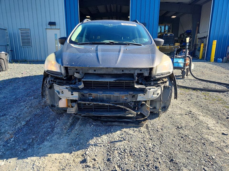 Photo 5 from auction – 2014 FORD ESCAPE with VIN 1FMCU0F72EUB66795