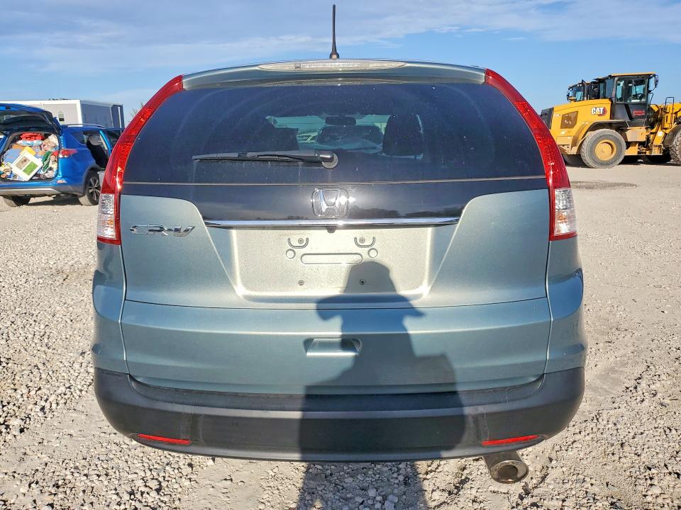 Photo 6 from auction – 2012 HONDA CR-V with VIN 5J6RM3H55CL001610