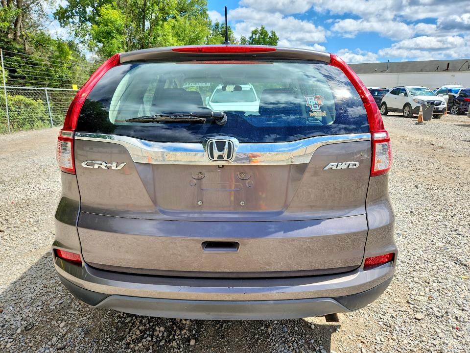 Photo 6 from auction – 2015 HONDA CR-V with VIN 5J6RM4H39FL051676
