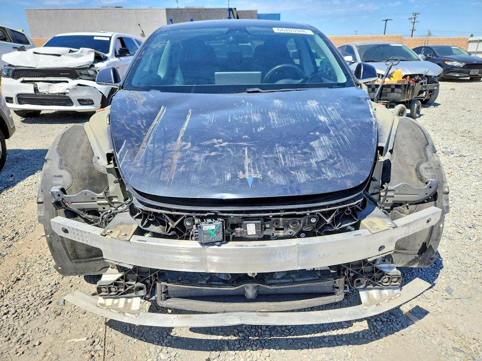 Снимка 5 от търг – 2018 TESLA MODEL 3 с VIN 5YJ3E1EA5JF038512