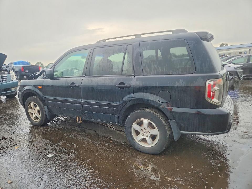 Photo 2 from auction – 2006 HONDA PILOT with VIN 2HKYF18406H563883