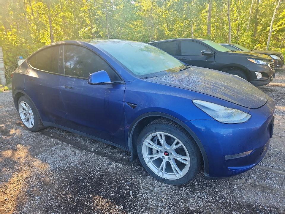 Photo 4 from auction – 2021 TESLA MODEL Y with VIN 5YJYGDEE4MF185557