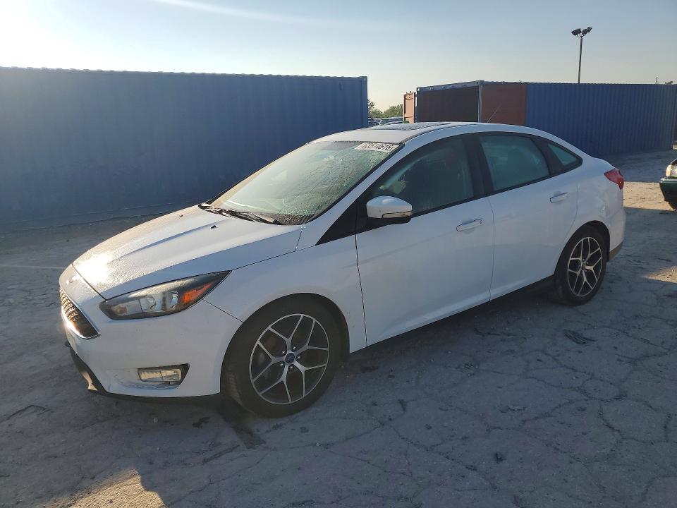 FORD FOCUS 2018 with VIN 1FADP3H27JL284673 - Photo from auction
