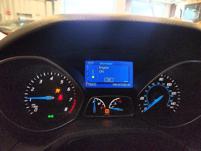 Photo 9 from auction – 2014 FORD FOCUS with VIN 1FADP3F29EL194675