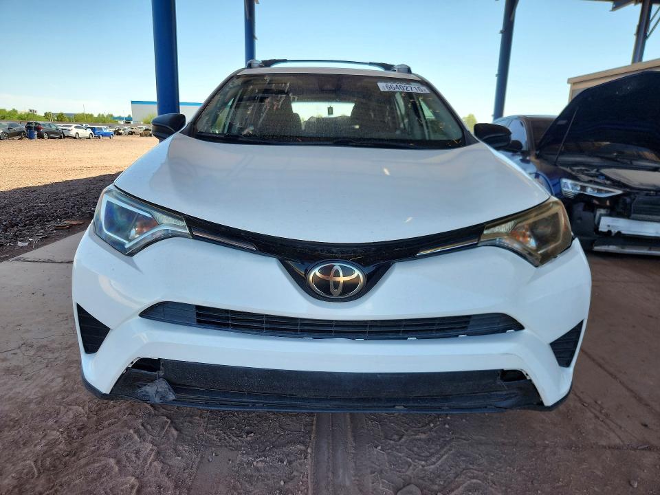Photo 5 from auction – 2018 TOYOTA RAV4 with VIN JTMZFREV7JJ732572