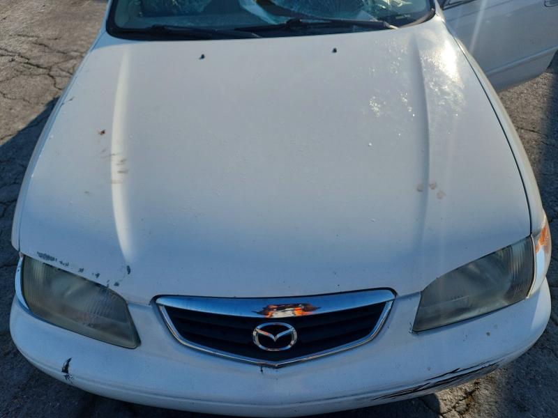 Photo 11 from auction – 2000 MAZDA 626 with VIN 1YVGF22D3Y5179054