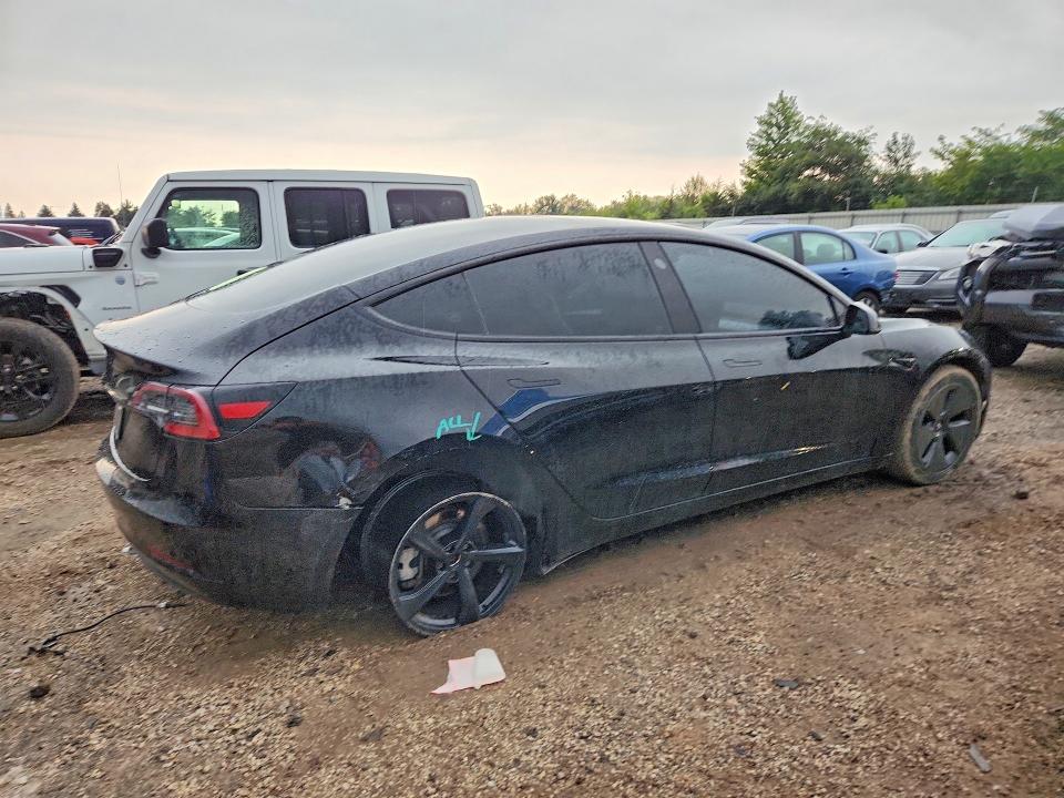 Photo 3 from auction – 2023 TESLA MODEL 3 with VIN 5YJ3E1EA8PF687164