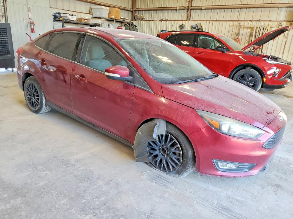 Foto 4 de la subasta – 2016 FORD FOCUS con VIN 1FADP3FE4GL234464