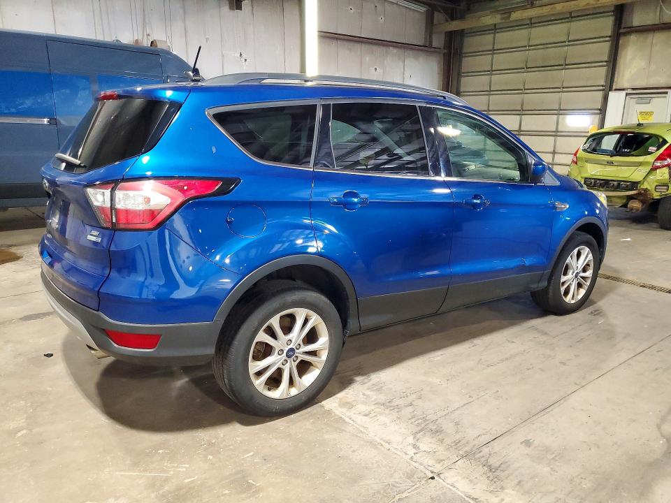 Photo 3 from auction – 2018 FORD ESCAPE with VIN 1FMCU9GD1JUA28409