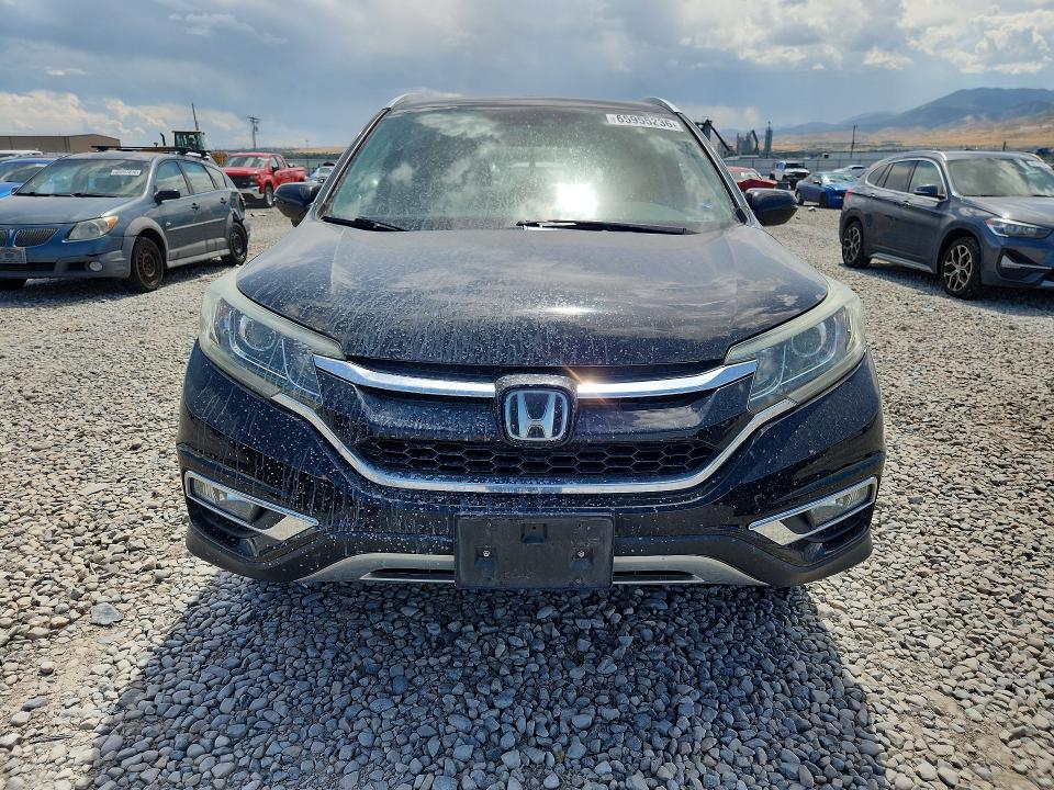 Photo 5 from auction – 2015 HONDA CR-V with VIN 5J6RM3H96FL002806