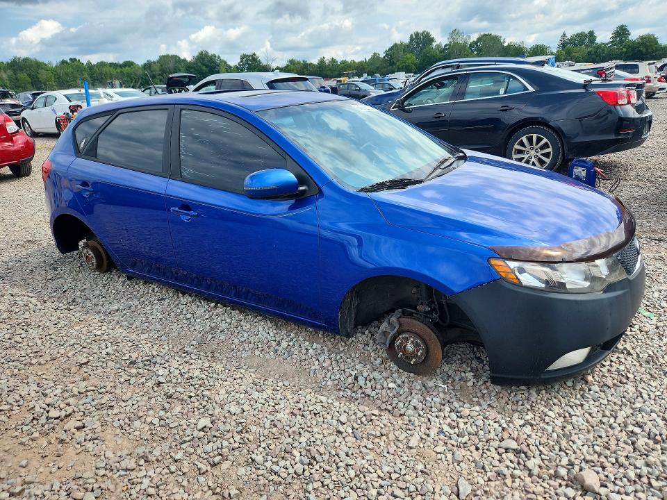 Photo 4 from auction – 2011 KIA FORTE5 with VIN KNAFW5A38B5372946