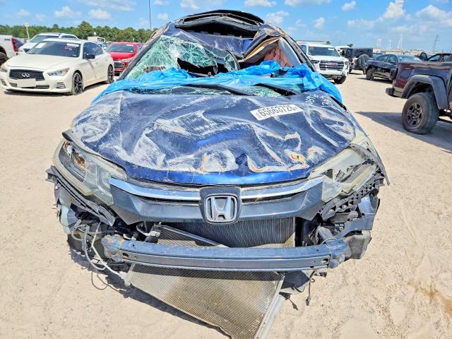 Photo 5 from auction – 2016 HONDA CR-V with VIN 3CZRM3H51GG721571