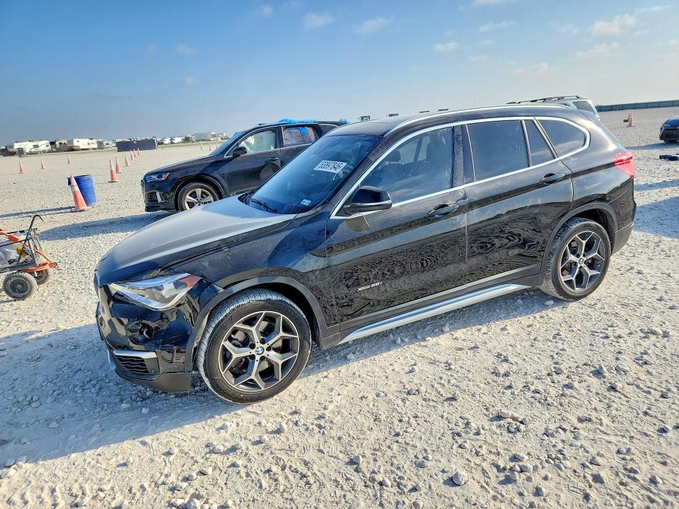 BMW X1 2017 z numerem VIN WBXHT3Z32H4A57108 - Zdjęcie z aukcji