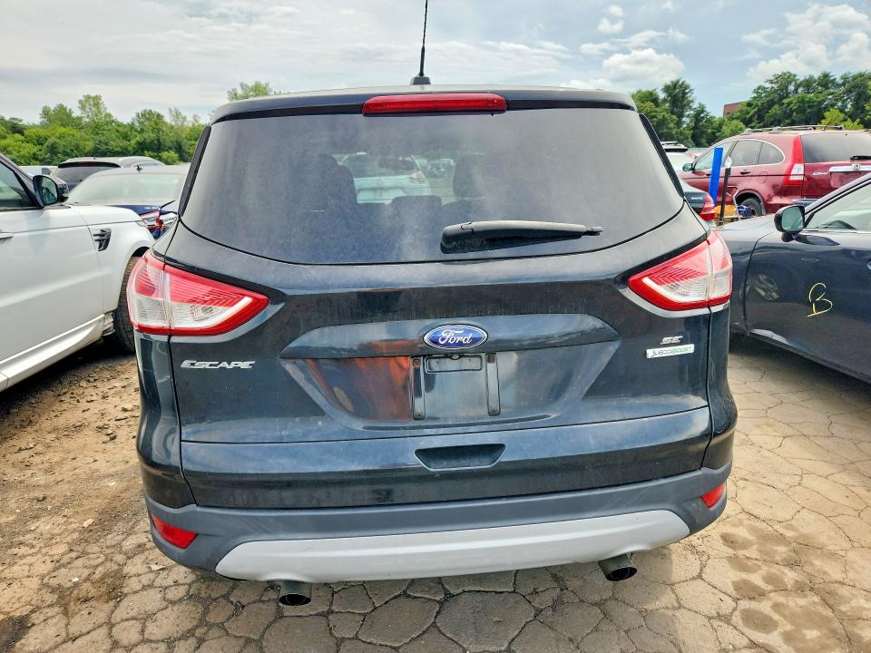 Photo 6 from auction – 2014 FORD ESCAPE with VIN 1FMCU0GX4EUB20593