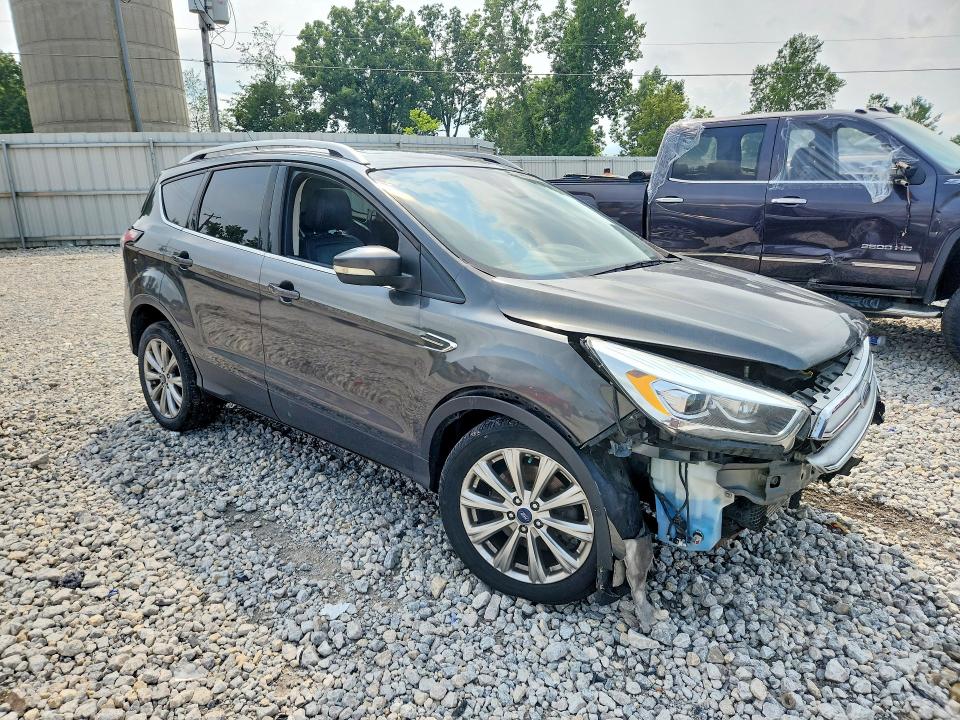 Photo 4 from auction – 2017 FORD ESCAPE with VIN 1FMCU9J91HUD68416