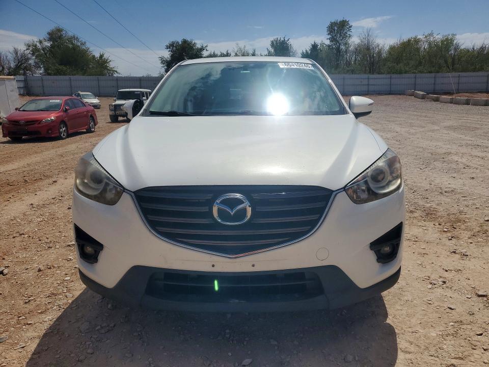 Фото 5 с аукциона – 2016 MAZDA CX-5 с VIN JM3KE4DY3G0760300