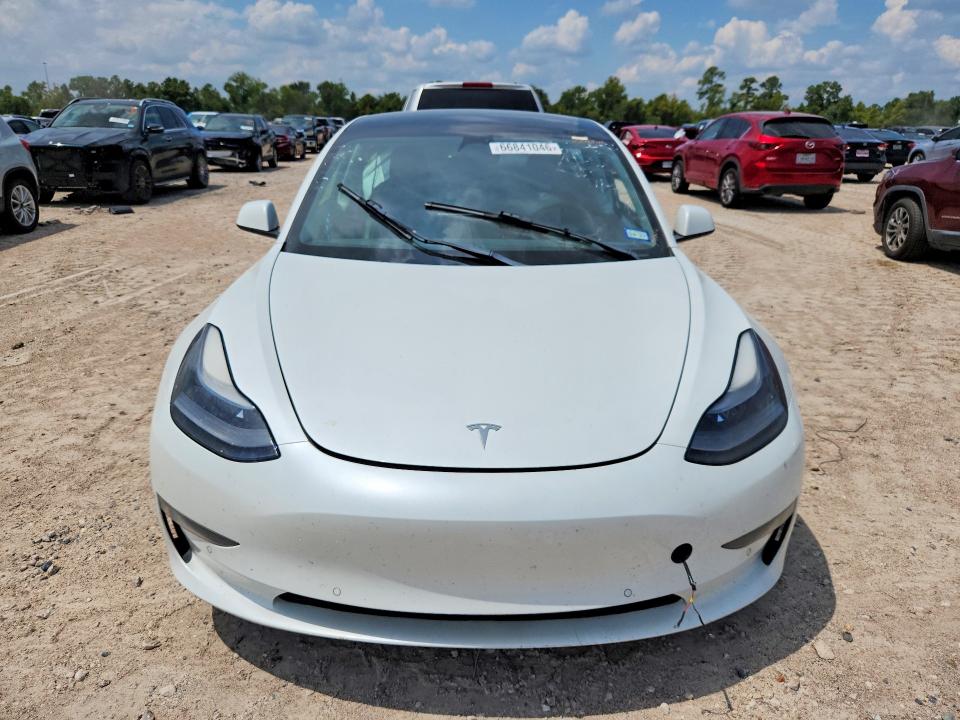 Photo 5 from auction – 2022 TESLA MODEL 3 with VIN 5YJ3E1EC7NF195238