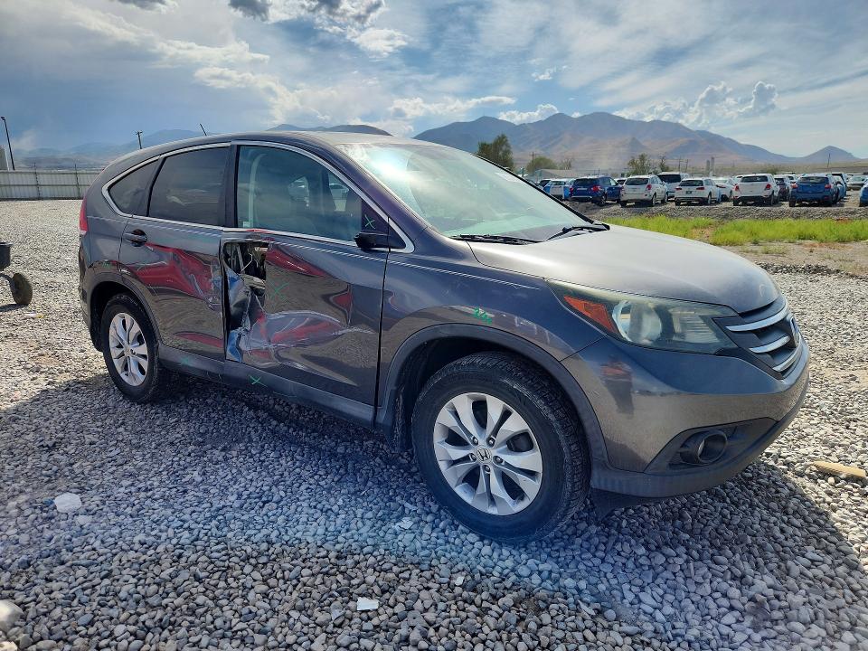 Photo 4 from auction – 2014 HONDA CR-V with VIN 2HKRM3H59EH562101