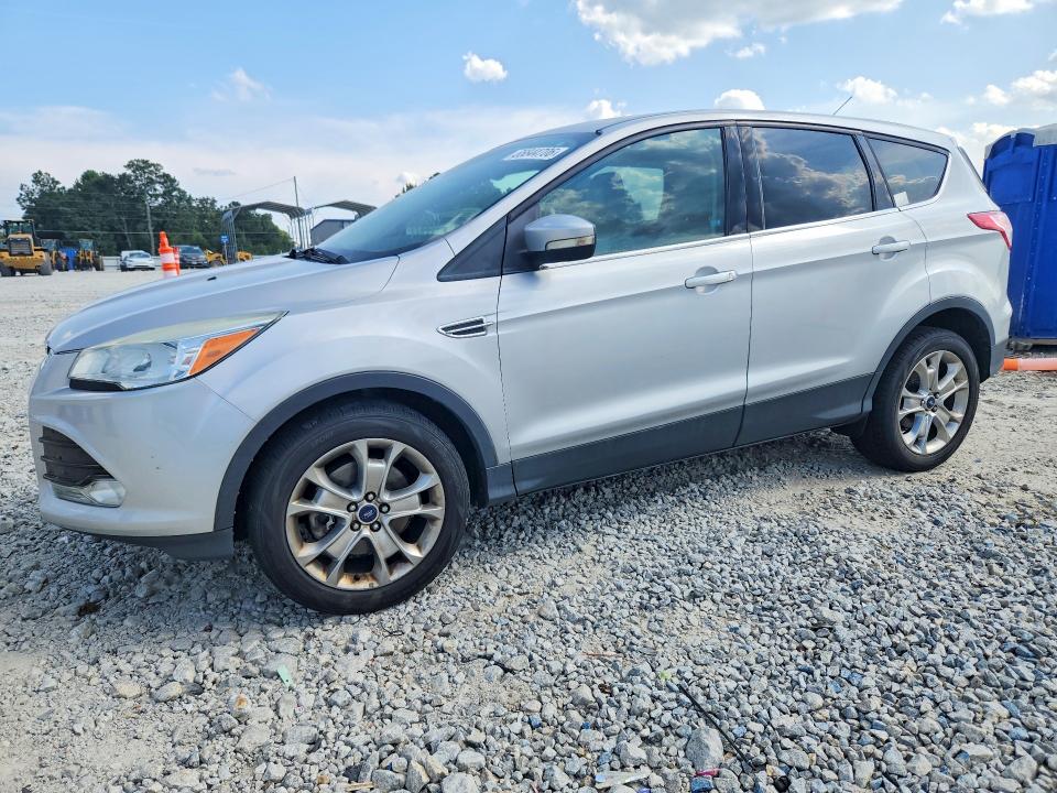 FORD ESCAPE 2013 with VIN 1FMCU0H99DUC79771 - Photo from auction