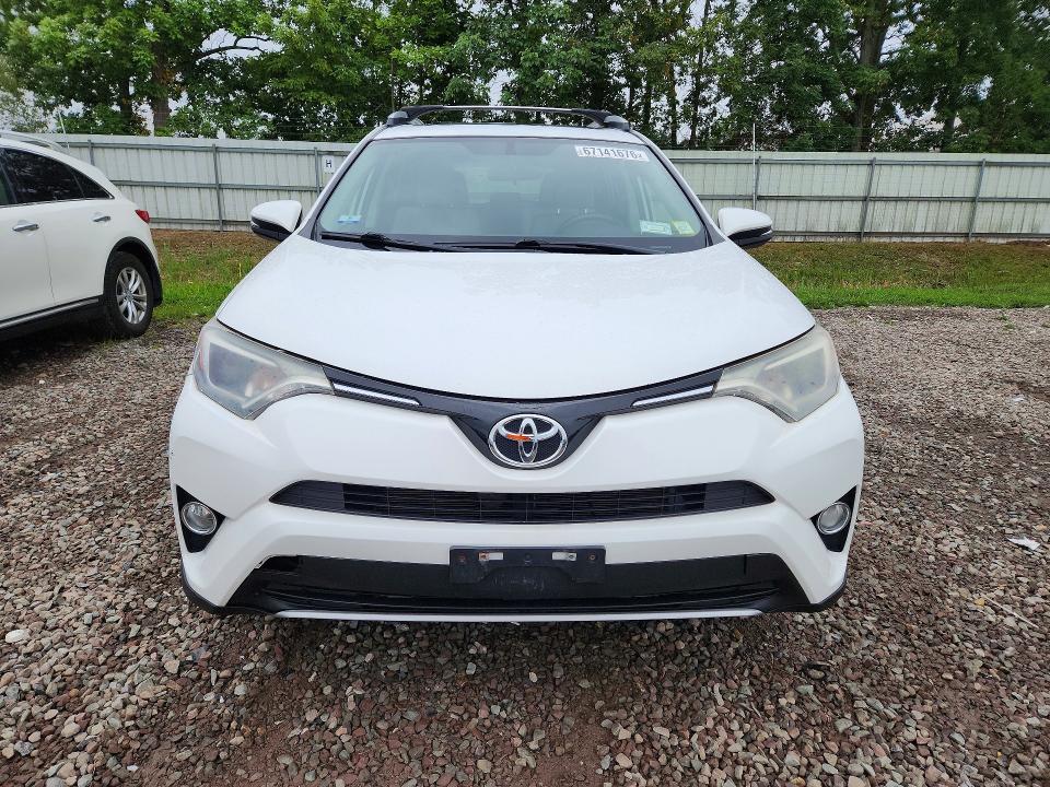 Photo 5 from auction – 2016 TOYOTA RAV4 with VIN JTMRFREV7GD197105