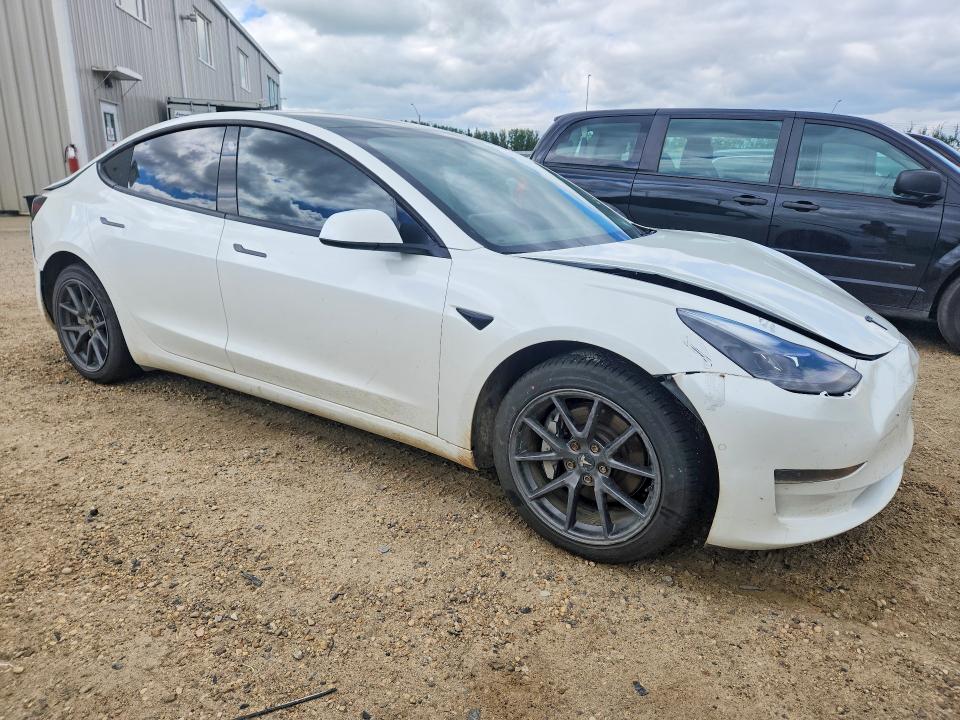 Photo 4 from auction – 2022 TESLA MODEL 3 with VIN 5YJ3E1EA0NF208782