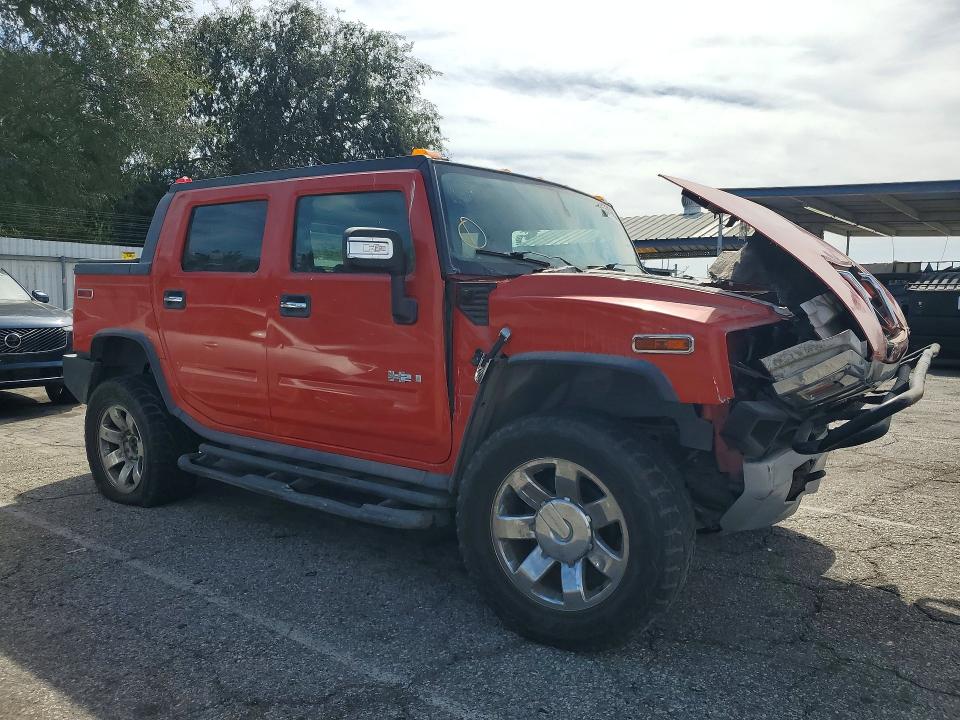 Photo 4 from auction – 2009 HUMMER H2 SUT with VIN 5GRGN02209H103026