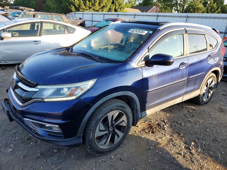 HONDA CR-V 2015 with VIN 5J6RM4H98FL035974 - Photo from auction