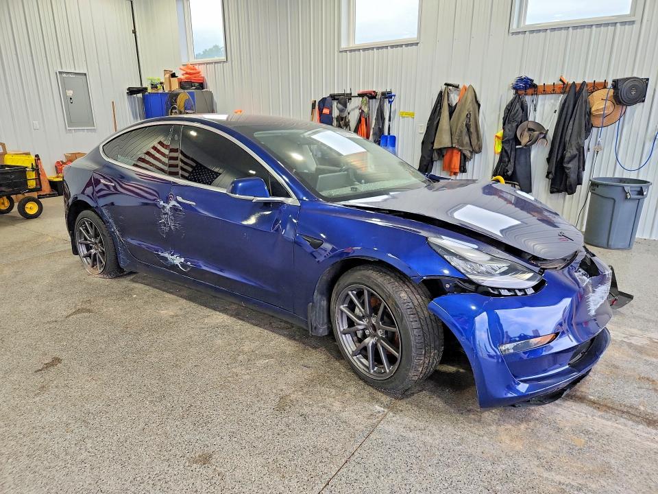 Photo 4 from auction – 2018 TESLA MODEL 3 with VIN 5YJ3E1EA5JF125035