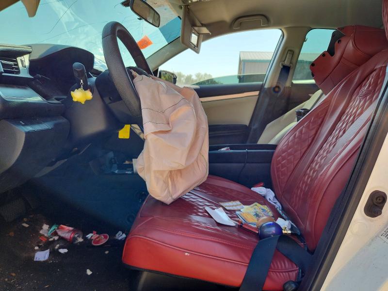 Photo 7 from auction – 2018 HONDA CIVIC with VIN 2HGFC2F55JH570235