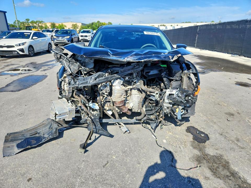 Photo 5 from auction – 2019 HONDA CIVIC with VIN 19XFC2F69KE011808
