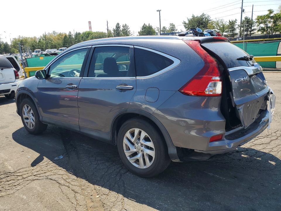 Photo 2 from auction – 2015 HONDA CR-V with VIN 2HKRM4H71FH683634