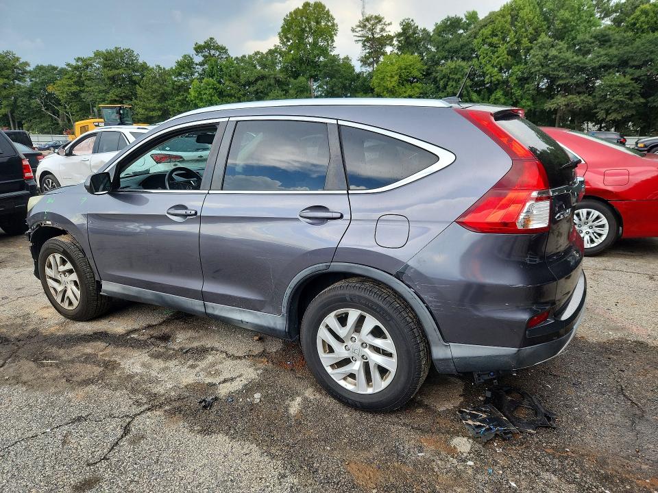 Photo 2 from auction – 2015 HONDA CR-V with VIN 2HKRM4H73FH654569