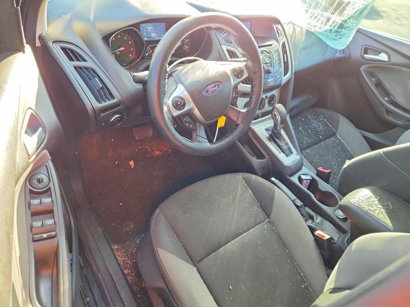 Photo 8 from auction – 2014 FORD FOCUS with VIN 1FADP3F24EL460040