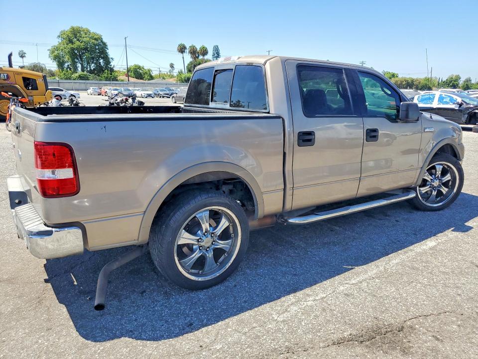 Photo 3 from auction – 2004 FORD F150 with VIN 1FTPW12564KD53851