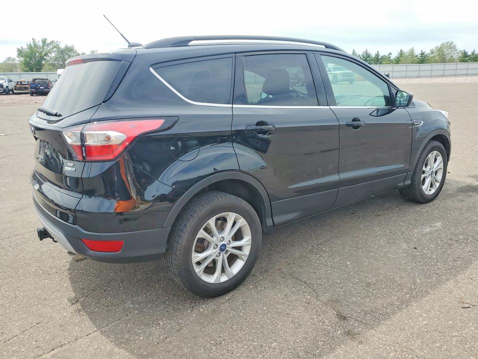 Photo 3 from auction – 2017 FORD ESCAPE with VIN 1FMCU9G9XHUB80694