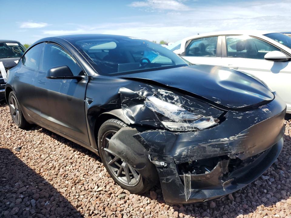 Photo 4 from auction – 2022 TESLA MODEL 3 with VIN 5YJ3E1EB2NF265493