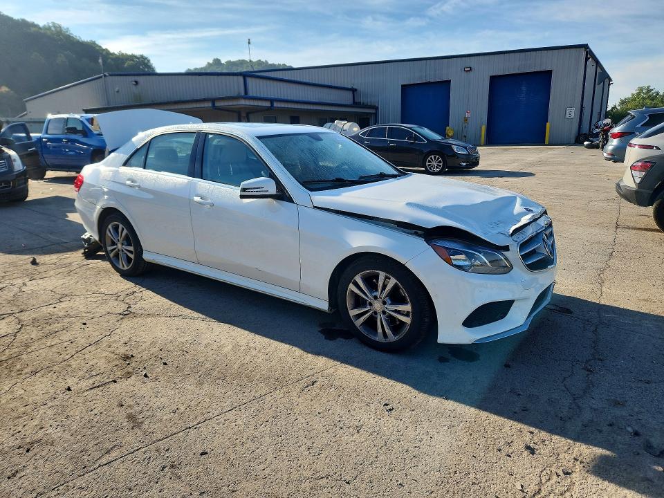Photo 4 from auction – 2016 MERCEDES-BENZ E with VIN WDDHF9HBXGB200965