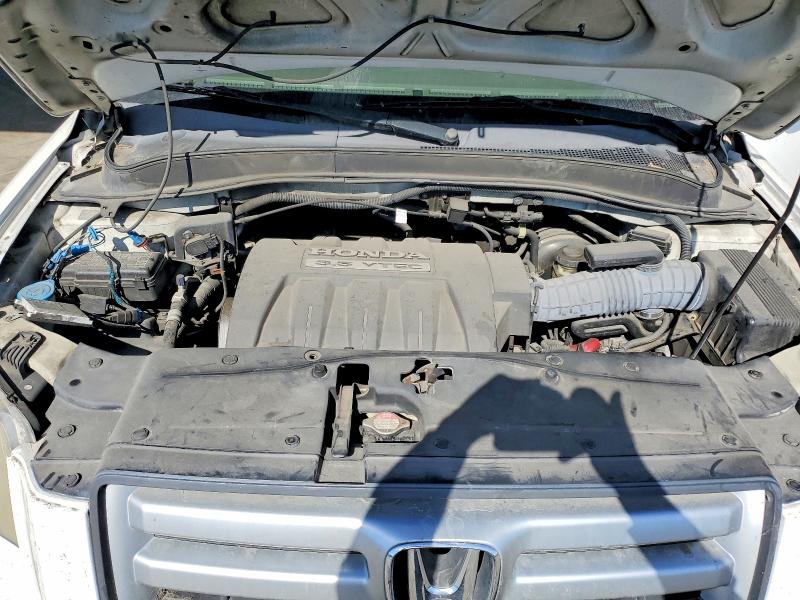Photo 11 from auction – 2006 HONDA PILOT with VIN 2HKYF18636H560686