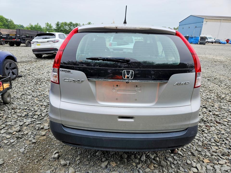 Photo 6 from auction – 2014 HONDA CR-V with VIN 2HKRM4H38EH658614