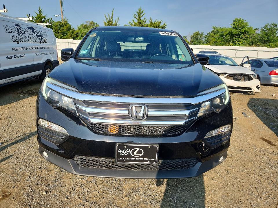 Photo 5 from auction – 2016 HONDA PILOT with VIN 5FNYF6H55GB079889
